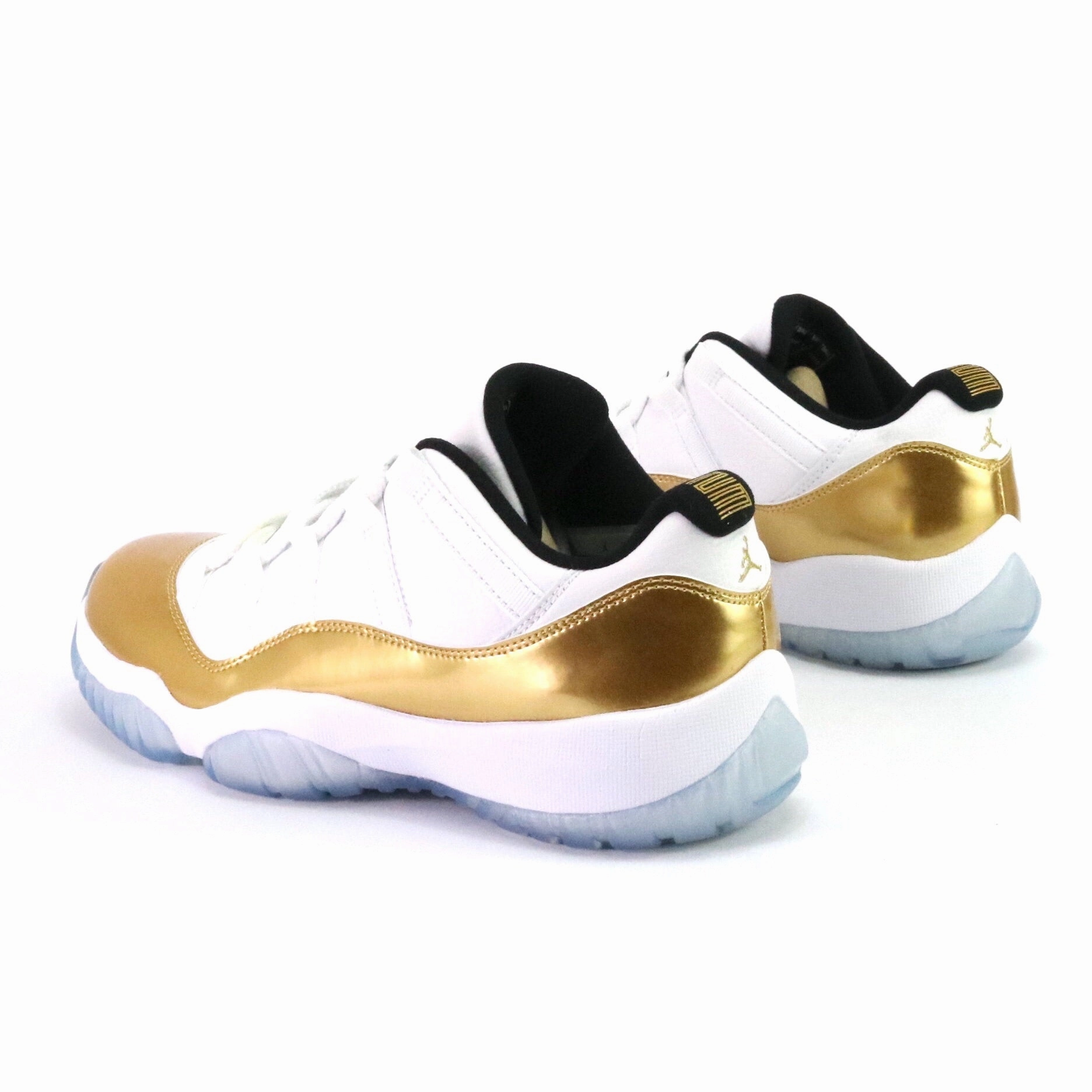 Air Jordan 11 Retro Low "Closing Ceremony" White Metallic Gold Coin Black Retro Sneakers