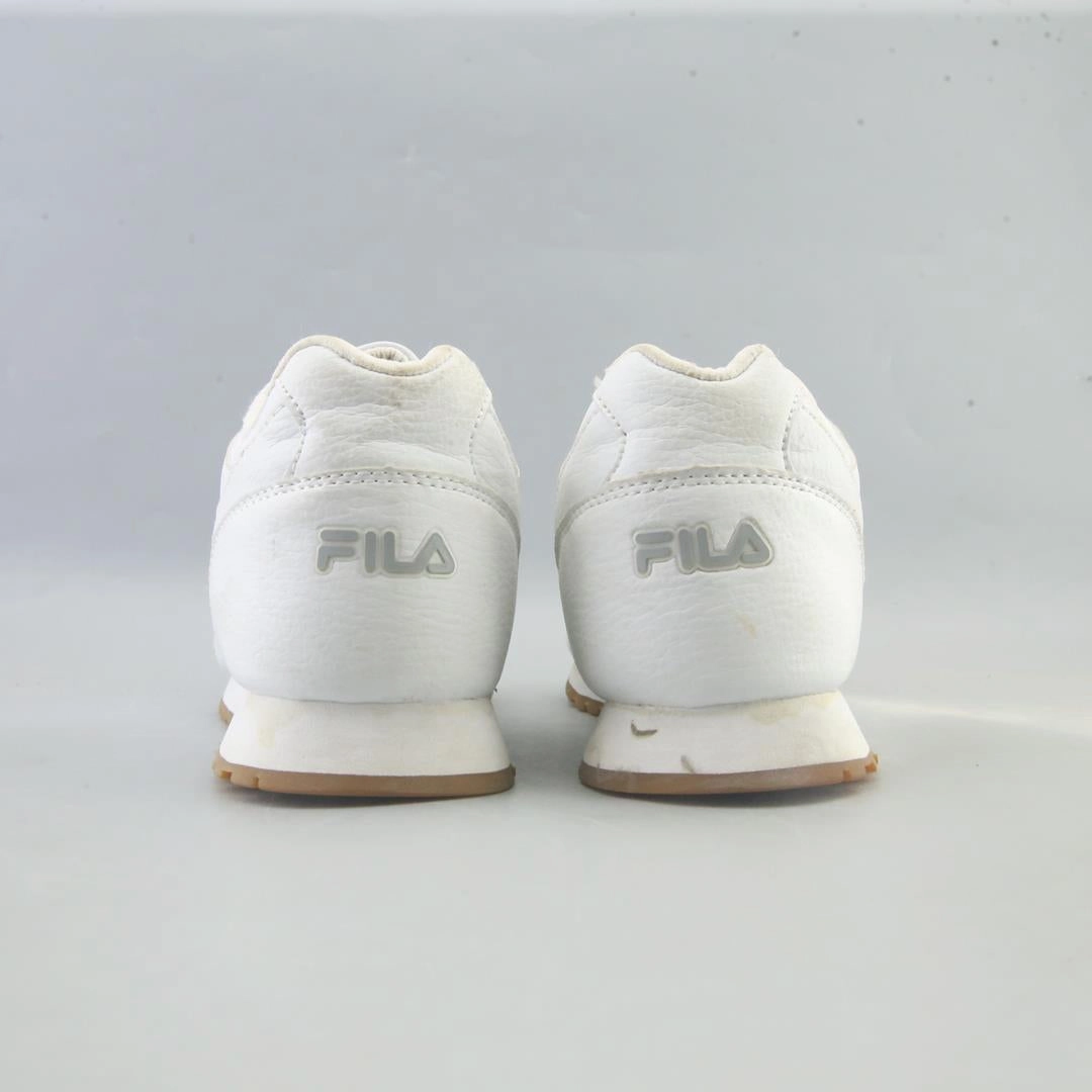 FILA . Fila athletic shoe visuals