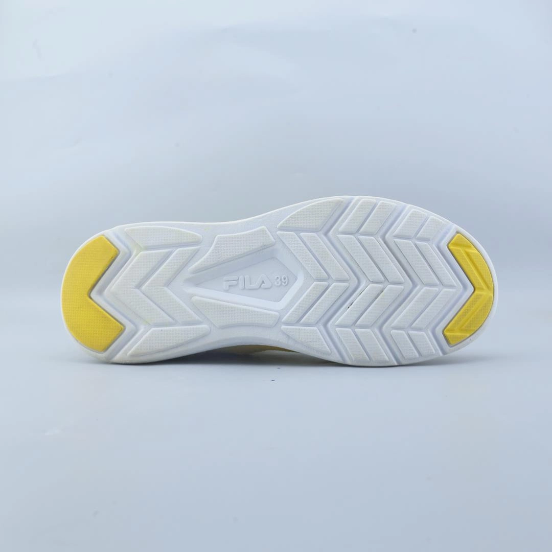 FILA . Fila athletic shoe visuals