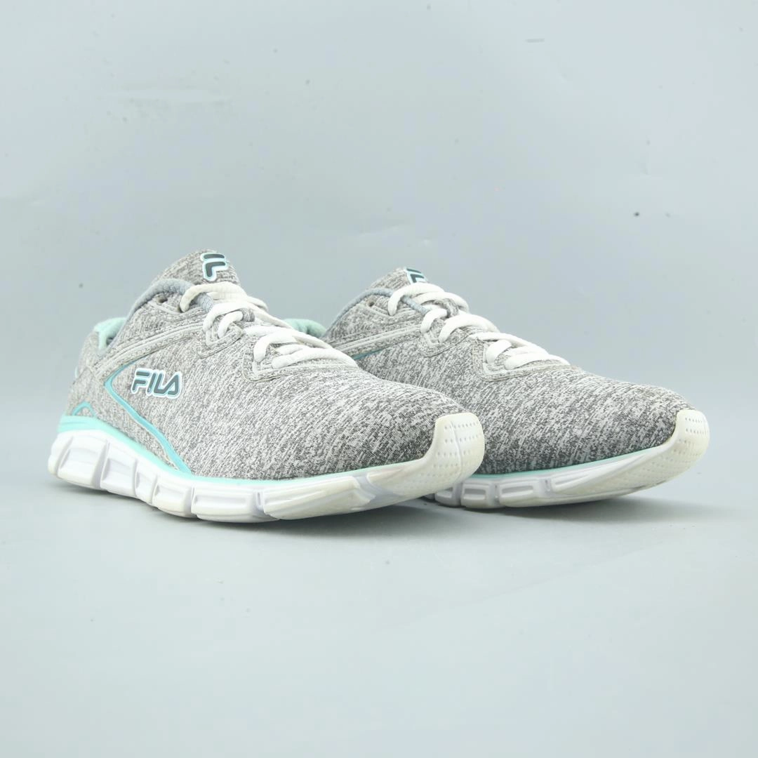 FILA . Fila athletic shoe visuals