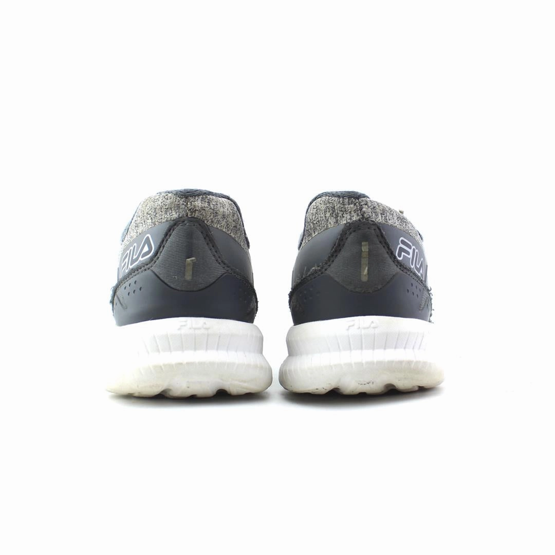 FILA . Fila athletic shoe visuals