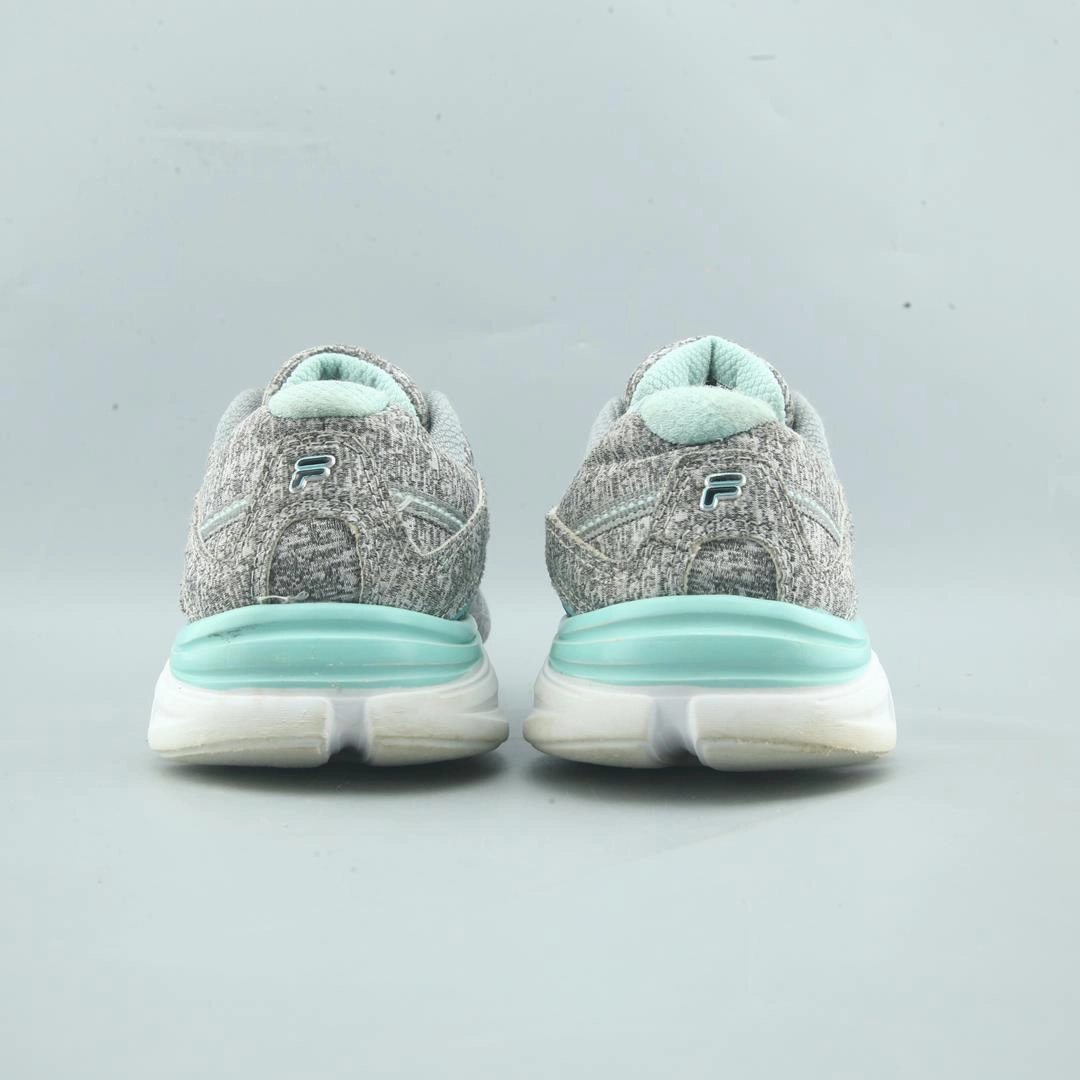 FILA . Fila athletic shoe visuals