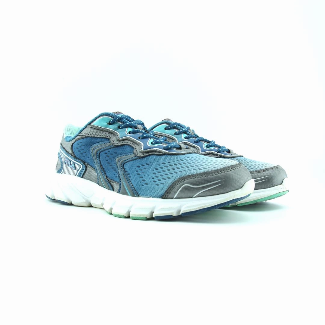 FILA . Fila athletic shoe visuals