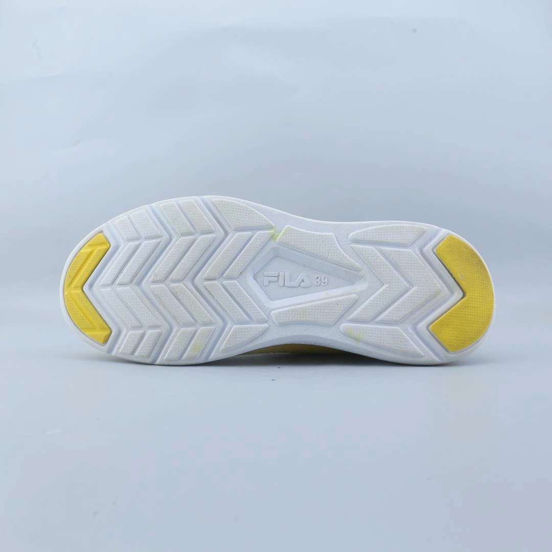 FILA . Fila athletic shoe visuals