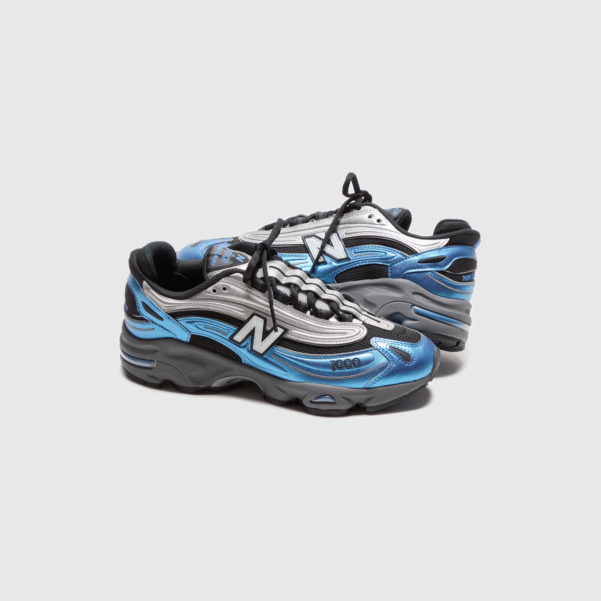 New Balance M1000 - Metallic Blue Nike Air Force 1 edition