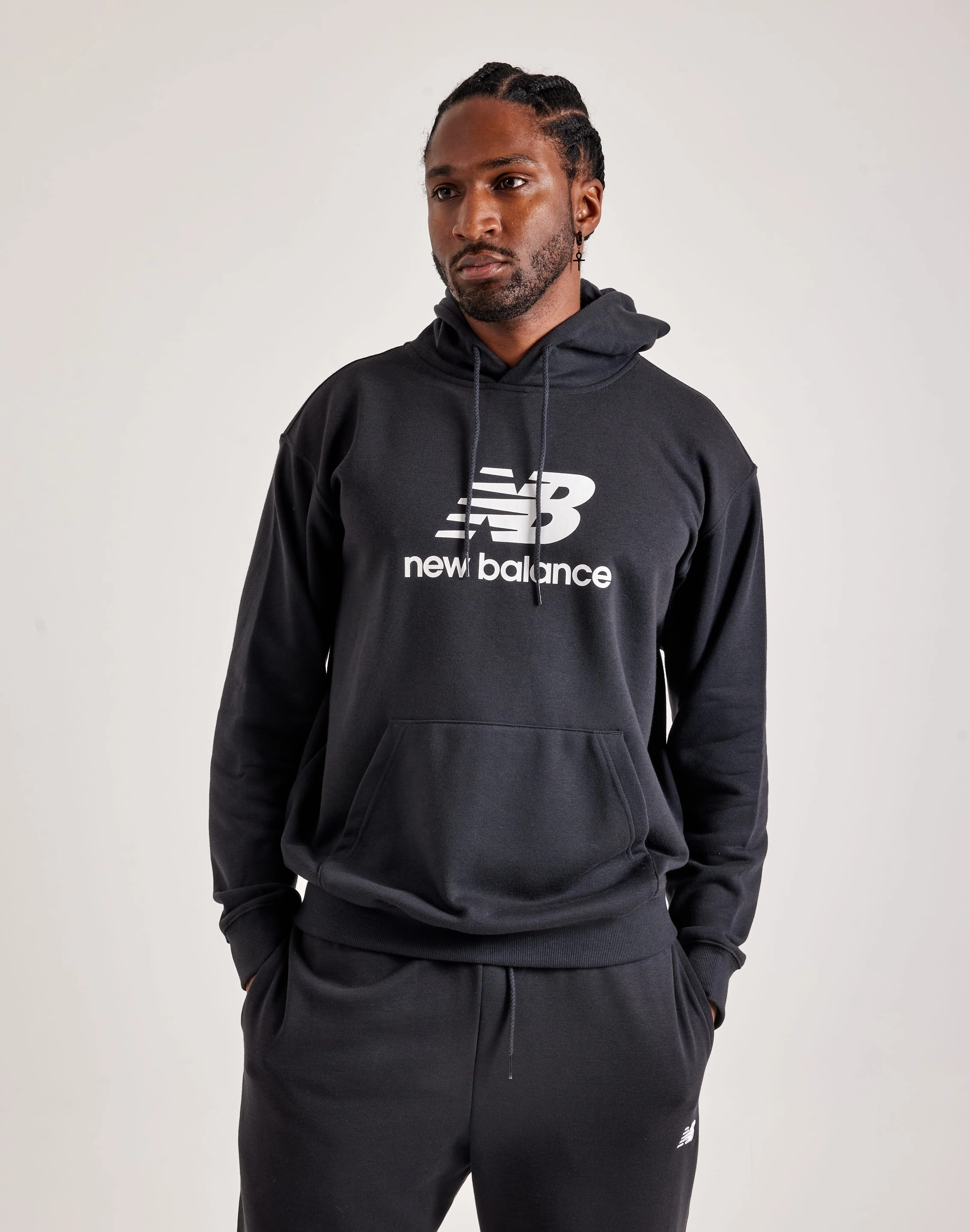 New Balance Sport Essentials French Terry Logo Hoodie New Balance sneakers with cushioned midsoles