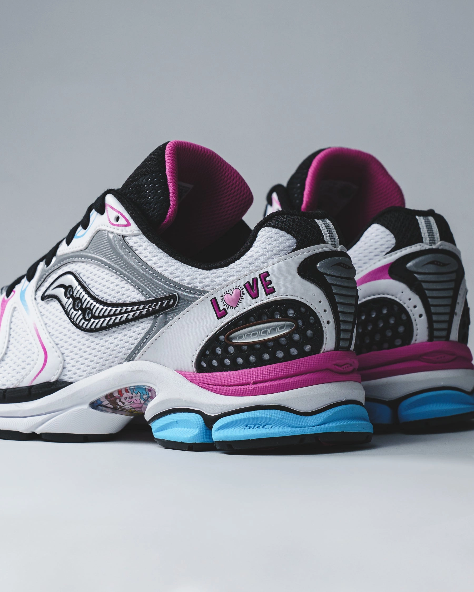 Saucony x Keith Haring Men ProGrid Triumph 4 White Multi S70974-1 Saucony high-speed running shoes
